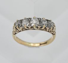 An 18ct diamond set five stone ring, size N.