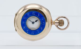 A 9ct gold Waltham half hunter pocket watch with blue enamel decoration to the cover, approx. 37g.