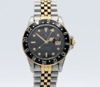 Rolex, a 1980's gents steel and gold Oyster Perpetual GMT- Master Superlative Chronometer with date,