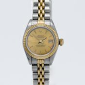 Rolex, a ladies steel and gold Datejust Chronometer with jubilee bracelet, champagne baton dial.