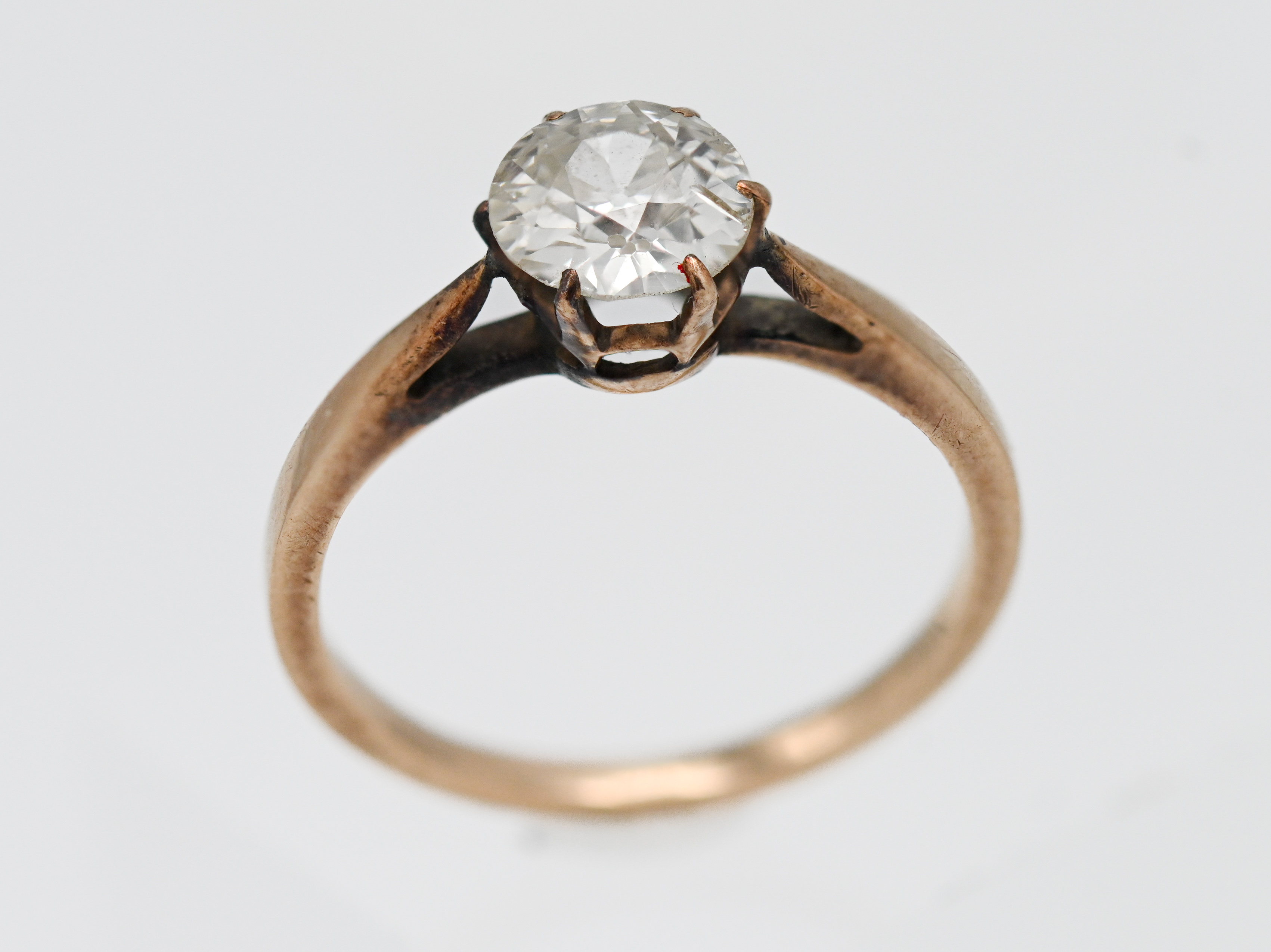 An old brilliant cut diamond single stone ring, claw setting, no hallmark, approx. 0.70ct, size H.