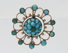 A Victorian yellow gold open filigree work round turquoise set brooch, approx. 3.5g.