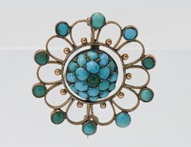 A Victorian yellow gold open filigree work round turquoise set brooch, approx. 3.5g.