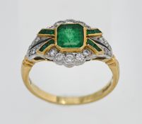 An emerald and diamond ring set in 18ct yellow gold with centre emerald (6mm x 5.5mm) with cut