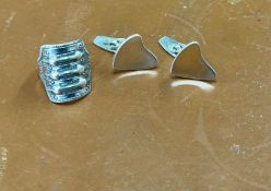 A pair of Arne Johansen, Danish silver cufflinks of stylised heart shape