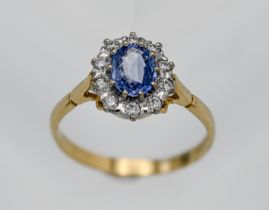 A sapphire and diamond cluster ring, size V.