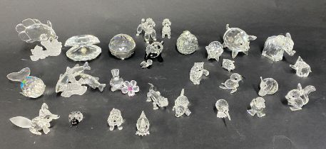 Swarovski Crystal Glass, a mixed collection of mostly animals, including three pigs of different