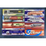 A large collection of 18 boxed model haulage trucks. 1:50 scale. Limited edition collectables,