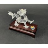 Swarovski Crystal Glass, 'Dragon' with wooden stand, boxed.