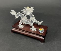 Swarovski Crystal Glass, 'Dragon' with wooden stand, boxed.