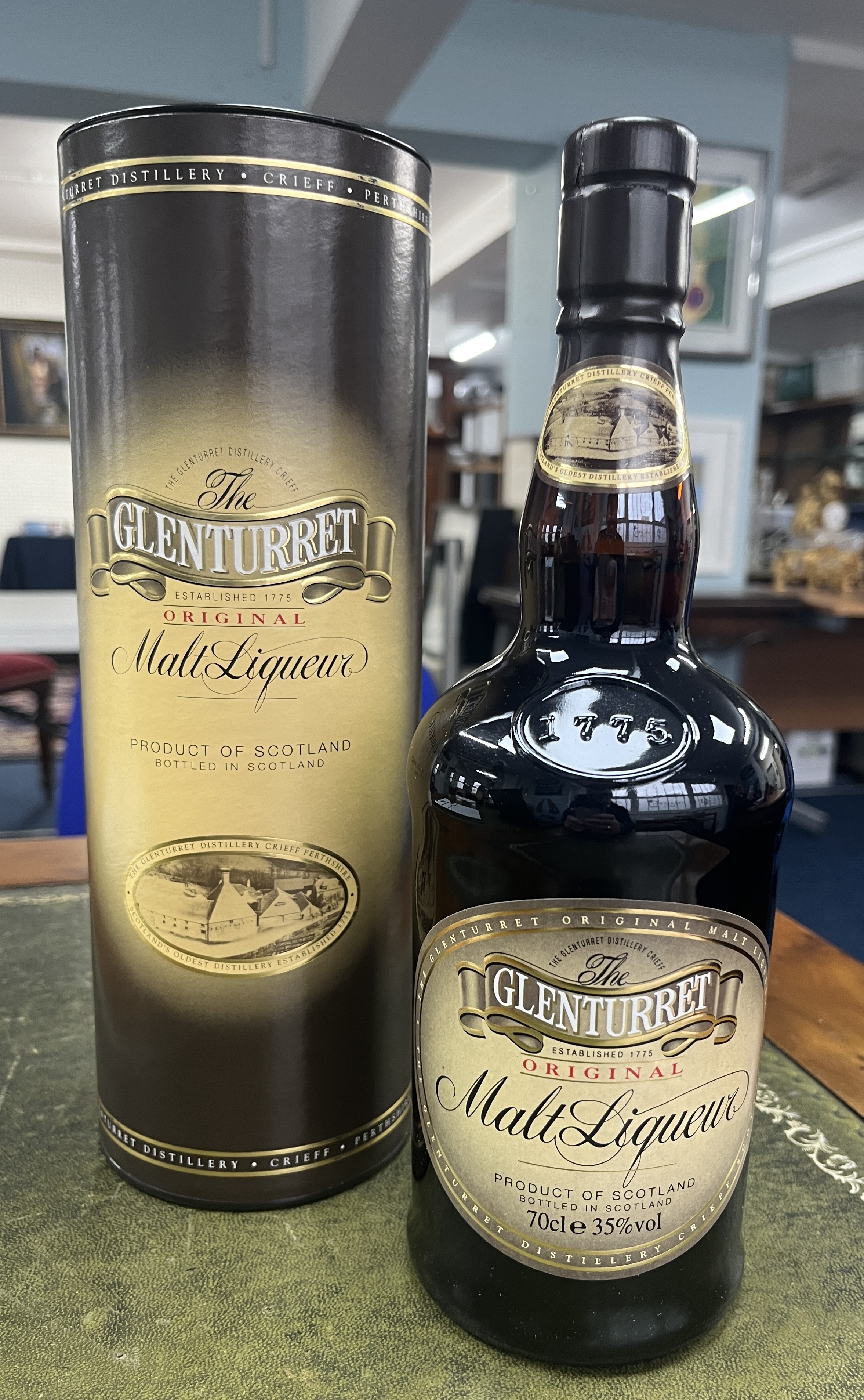 A single bottle, The Glenturret original malt liqueur, boxed