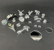 Swarovski Crystal Glass, a collection of unboxed pieces including yellow Tulip, hedgehog, Snail on
