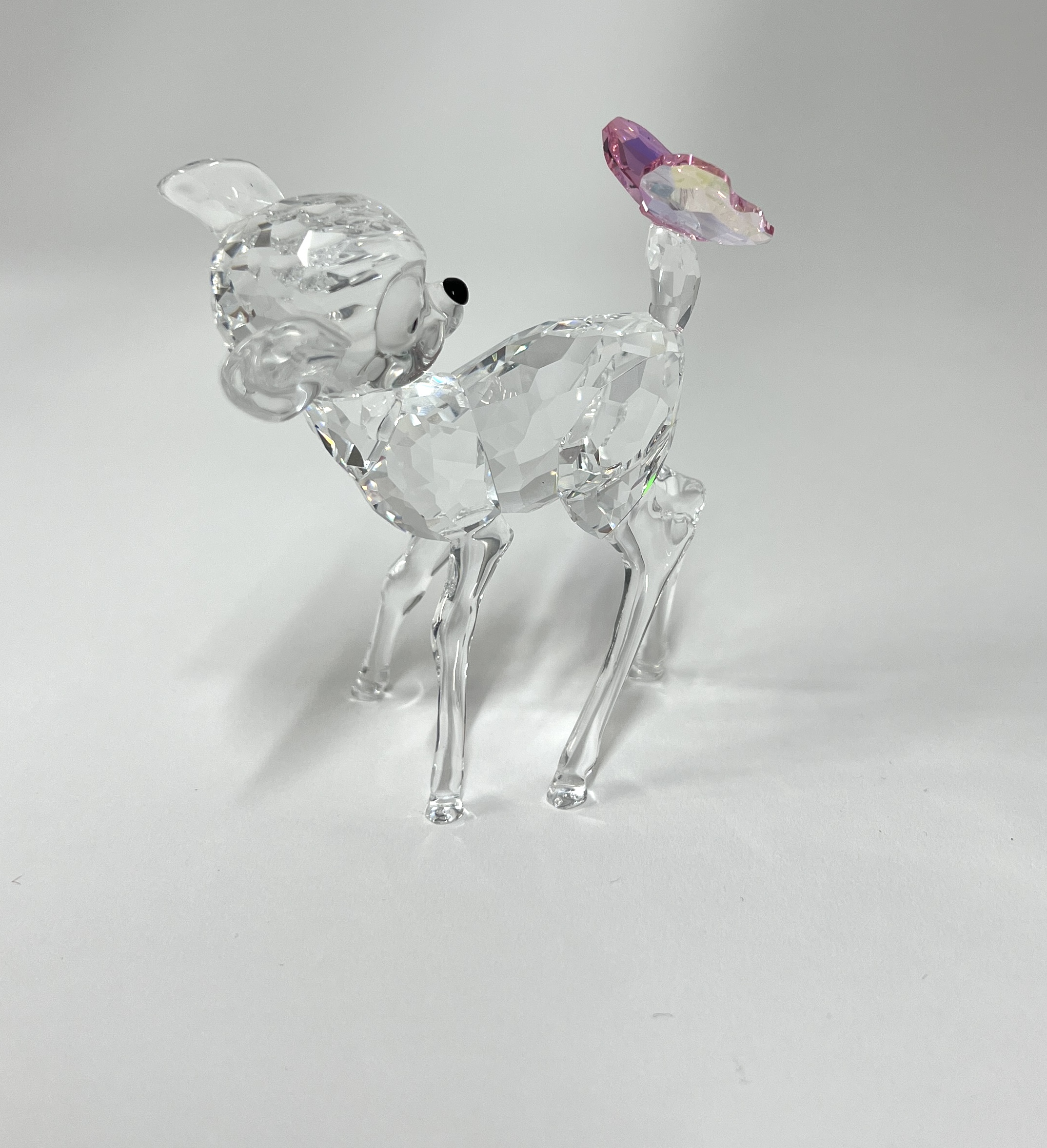 Swarovski Crystal Glass, 'Bambi' with pink butterfly, boxed.