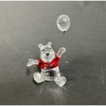 Swarovski Crystal Glass, 'Pooh' with balloon and red jumper, boxed.