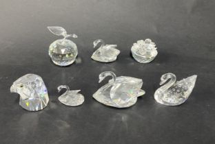 Swarovski Crystal Glass, a small collection of birds including an eagle head, four swans (one