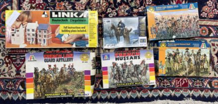 A collection of military figurines and models, makes by Master Box LTD, Italeri and Thomas Satler