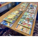 A collection of twenty four Rupert Annuals to include years 1951,1952,1953 etc.