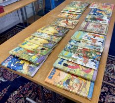 A collection of twenty four Rupert Annuals to include years 1951,1952,1953 etc.