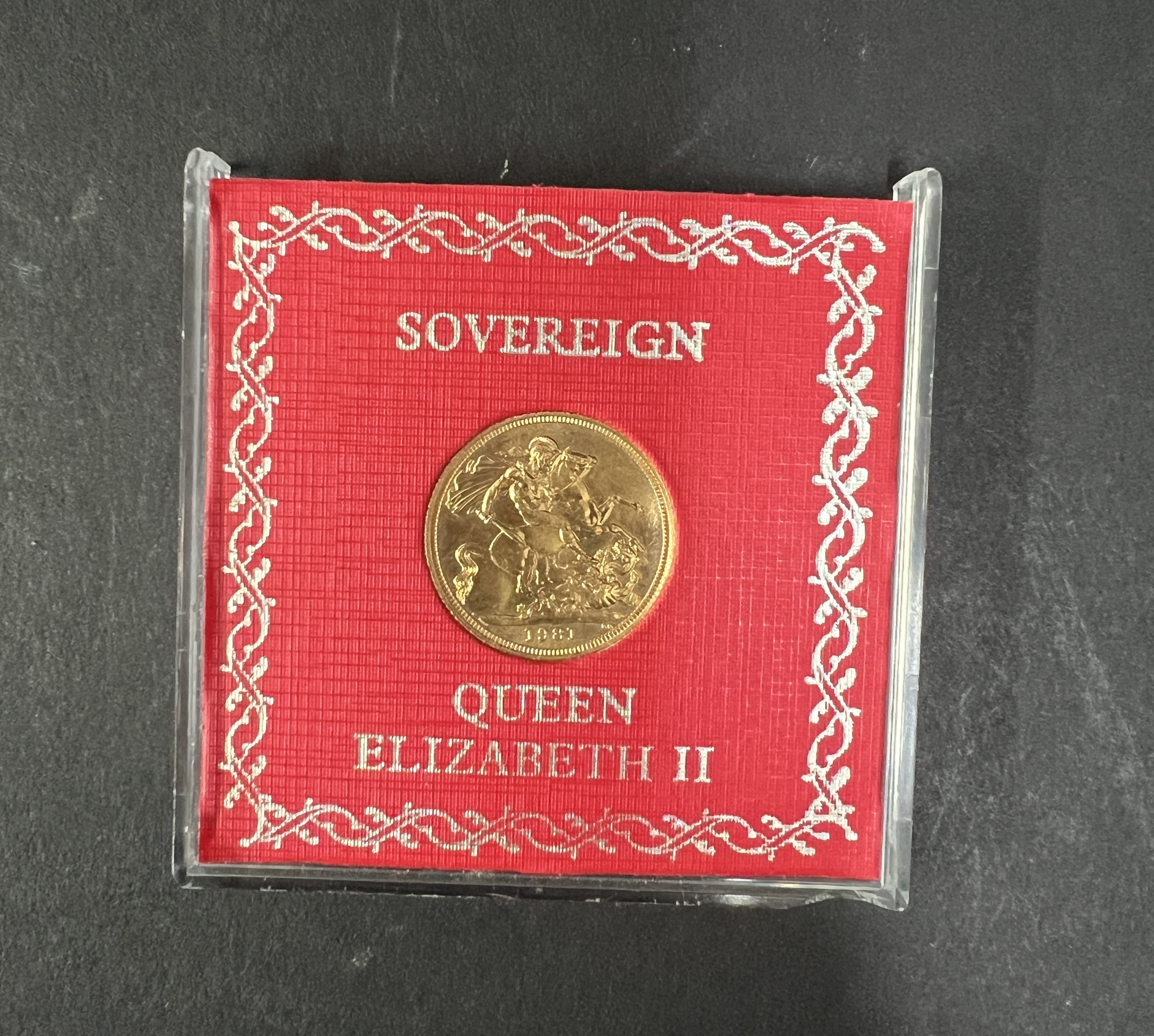 A Queen Elizabeth II 1981 full gold sovereign.