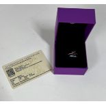 A 9k purple Mahenge Spinel ring, size S, with certificate of authenticity.