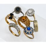 Seven assorted dress rings, two hallmarked 9 carat gold (375) (6.2 grams) another marked 585 set