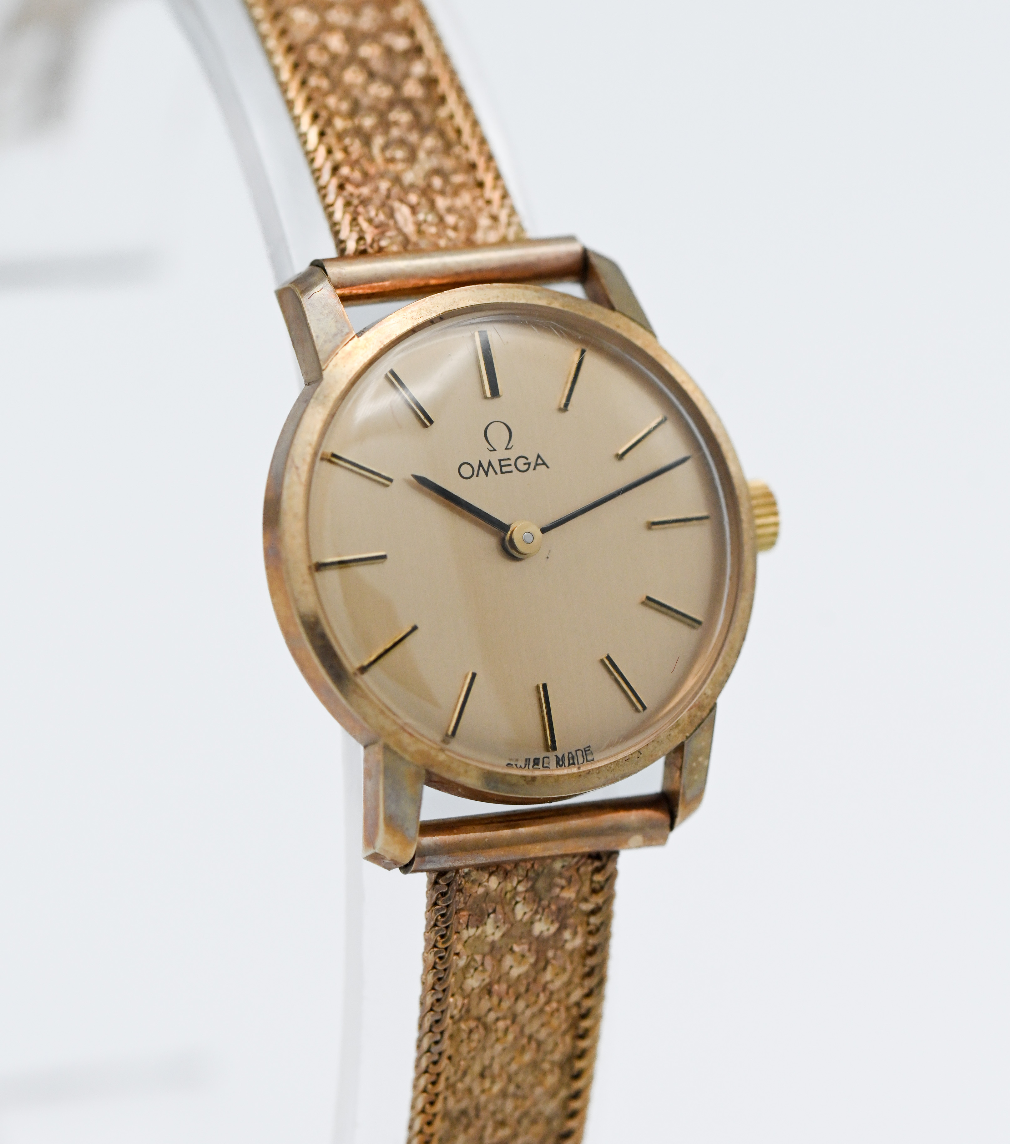 A ladies 9 carat gold Omega wristwatch, note full inscription on backplate. Approx 23.7 grams.