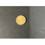 A gold 20 francs 1947 coin, approx. 6.46g.