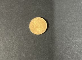 A gold 20 francs 1947 coin, approx. 6.46g.