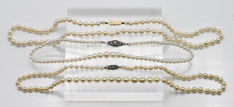 Three Cultured pearl necklaces to include single row with silver clasp, approx. length: 16cm, single