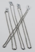 Four 9ct white gold chains, approx. 28.18g.