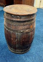 An antique barrel, copper-bound, approx. height 63cm x width 41cm.