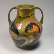 Moorcroft, a twin handed carp vase, height 34cm.