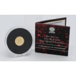 A gold quarter sovereign. 'Least we forget' in capsule, boxed