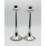 A pair of Art Nouveau sterling silver tulip candlesticks approx. 30cm, rubbed hallmark,