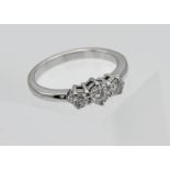 An 18ct white gold graduated 3-stone diamond ring, diamond sizes approx.: 1 x 4.05mm x 2.72 = 0.