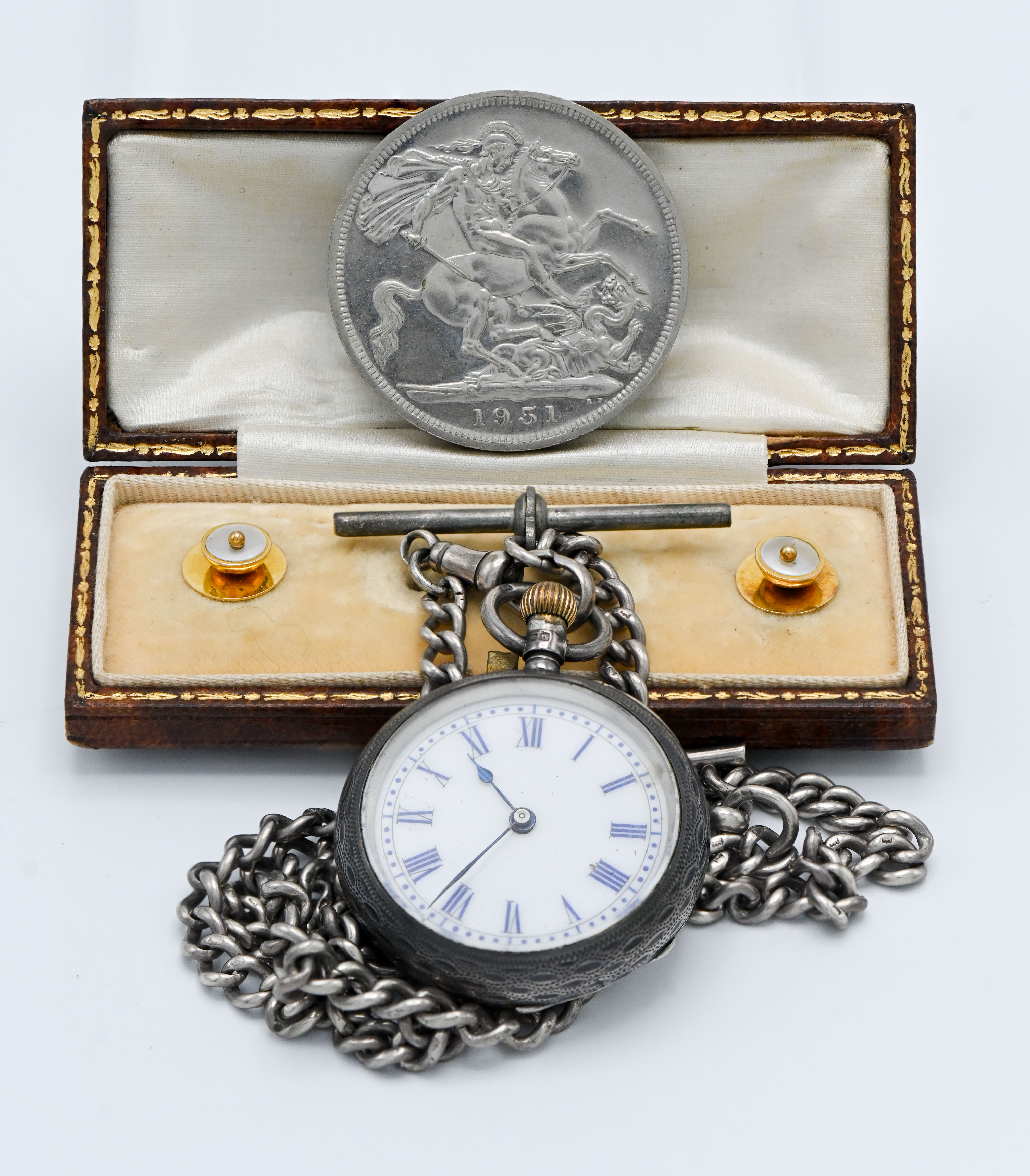 Two yellow metal collar studs, an antique silver cased fob watch on silver guard chain and a 1951