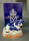 Royal Crown Derby, 'Friesian Cow, Buttercup' with gold stopper, boxed.