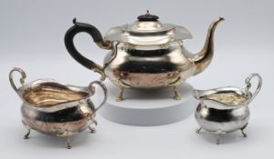 An Edwardian three piece silver tea service, approx. 35.60oz