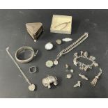A collection of silver items including a Geo VI triangular three feet jewellery box Birmingham,