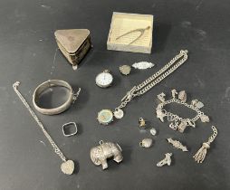 A collection of silver items including a Geo VI triangular three feet jewellery box Birmingham,