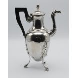 A French silver coffee pot (cafetiere) with horse head spout and three legs terminating in lion