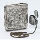 A silver cigarette case with chase decoration together with a Silver match striker (Vesta) approx.