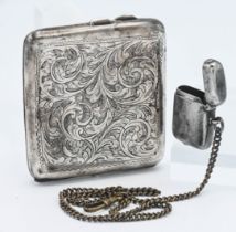 A silver cigarette case with chase decoration together with a Silver match striker (Vesta) approx.