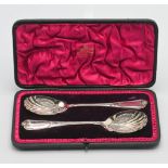 Mappin & Webb a pair Sheffield silver fancy serving spoons in original fitted case. 5.45oz.