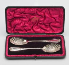 Mappin & Webb a pair Sheffield silver fancy serving spoons in original fitted case. 5.45oz.