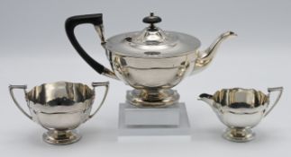 A George V three piece Walker & Hall silver tea service approx. 23.20oz