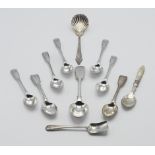 A sterling silver long handled and scalloped caddy spoon, an assortment of silver teaspoons etc.