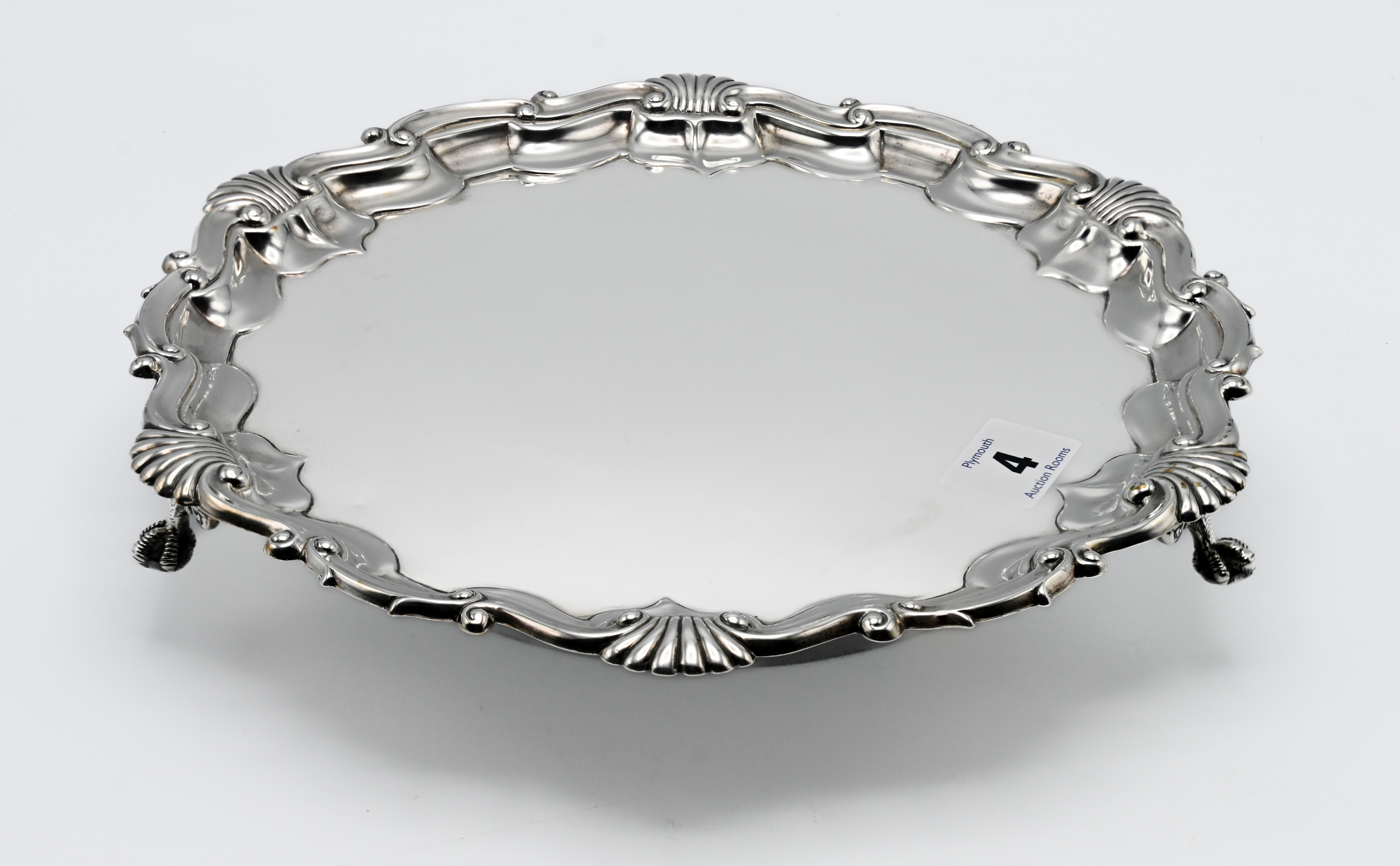 An Edwardian silver Goldsmiths & Silversmiths Company salver, diameter 26cm, approx. 17.2oz