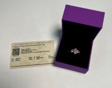 A 9k Spinel and diamond ring, size S, with certificate of authenticity.