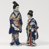 Blue glazed oriental figure in Geisha period costume with fan, height 31cm, together with a blue